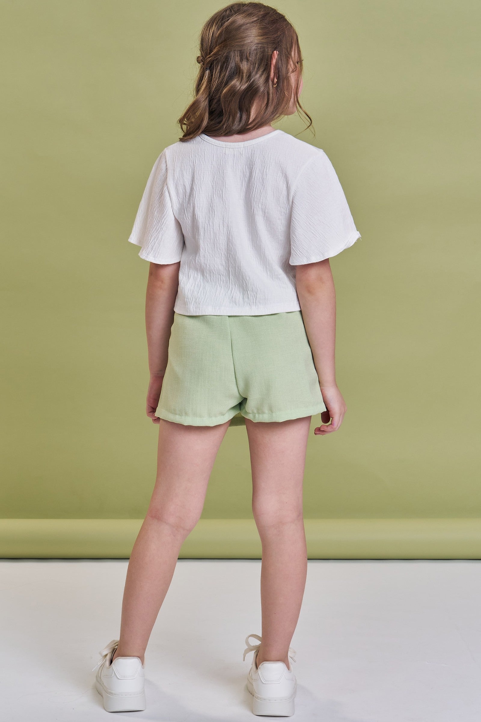 Conjunto de Blusa Boxy em Malha Wave e Short Saia em Tecido Texturizado 93014 Kukiê Infantil Menina