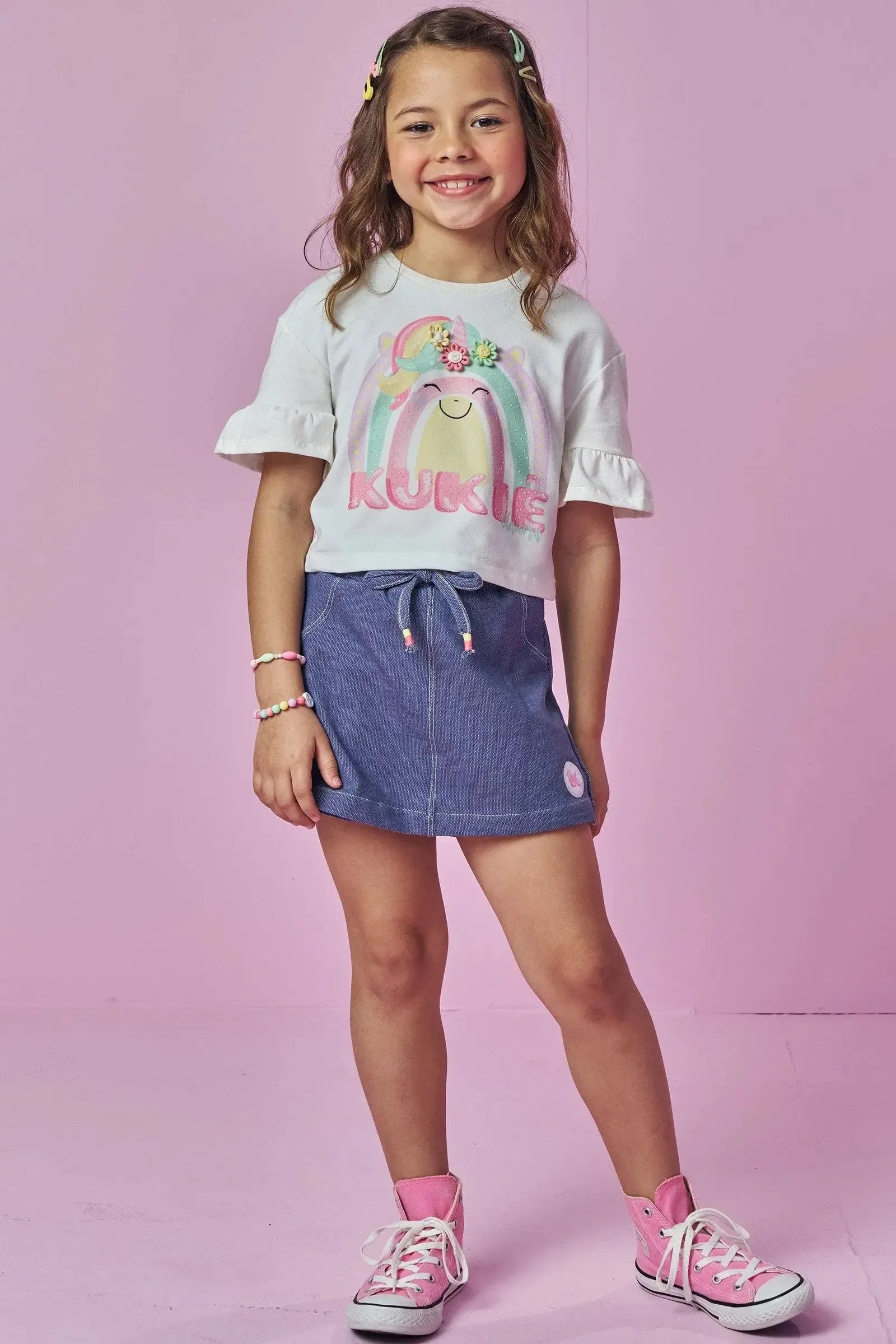 Conjunto de Blusa Boxy em Meia Malha e Short Saia em Malha Denim 93872 Kukiê Infantil Menina