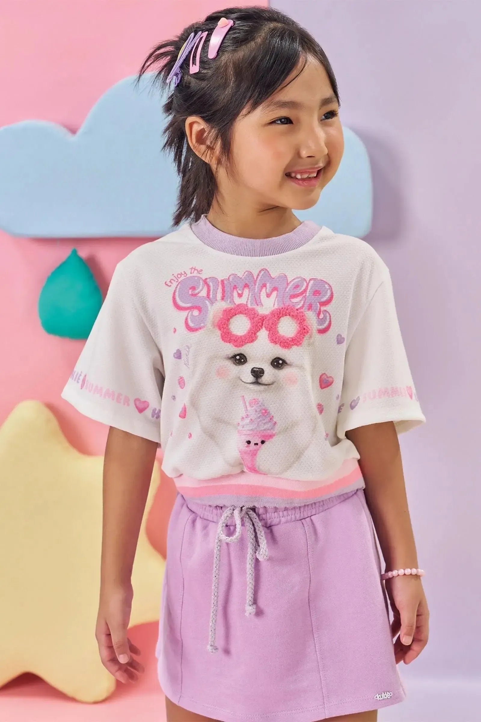 Conjunto de Blusa Boxy Over em Malha Favo e Short Saia em Moletom sem Pelúcia 84887 Kukiê Infantil Menina