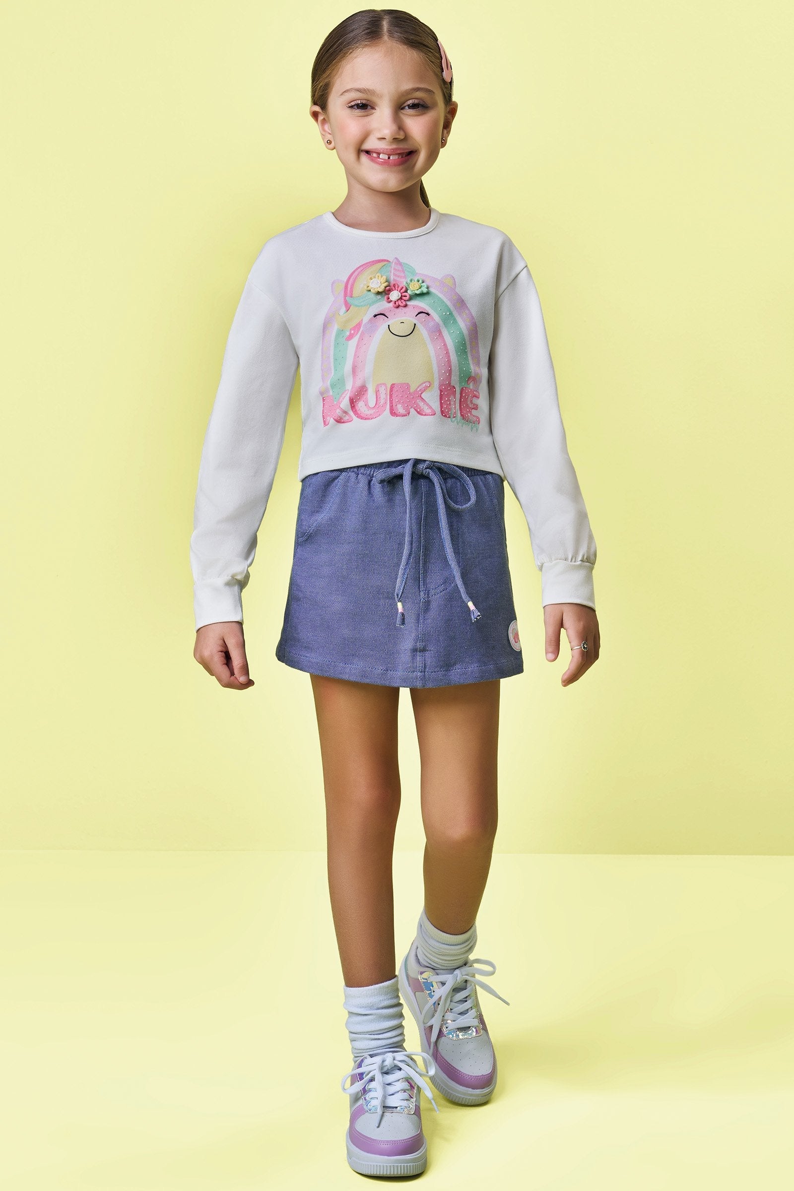 Conjunto de Blusa Boxy em Meia Malha e Short Saia em Malha Denin 90679 Kukiê Infantil Menina