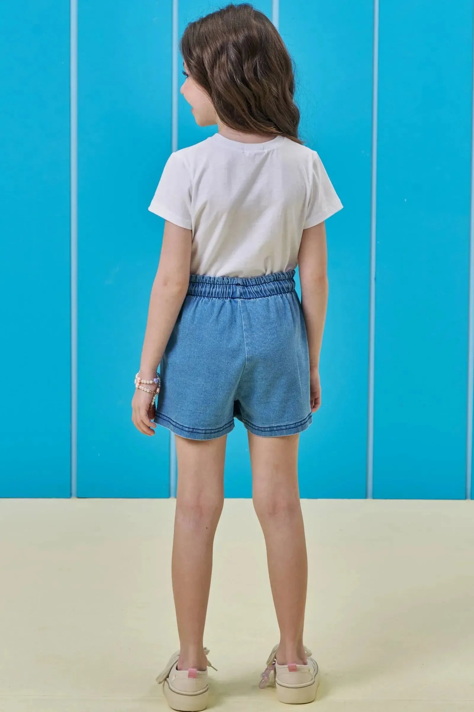 Conjunto de Blusa em Meia Malha e Short Saia em Jeans com Elastano 97132 Kukiê Infantil Menina