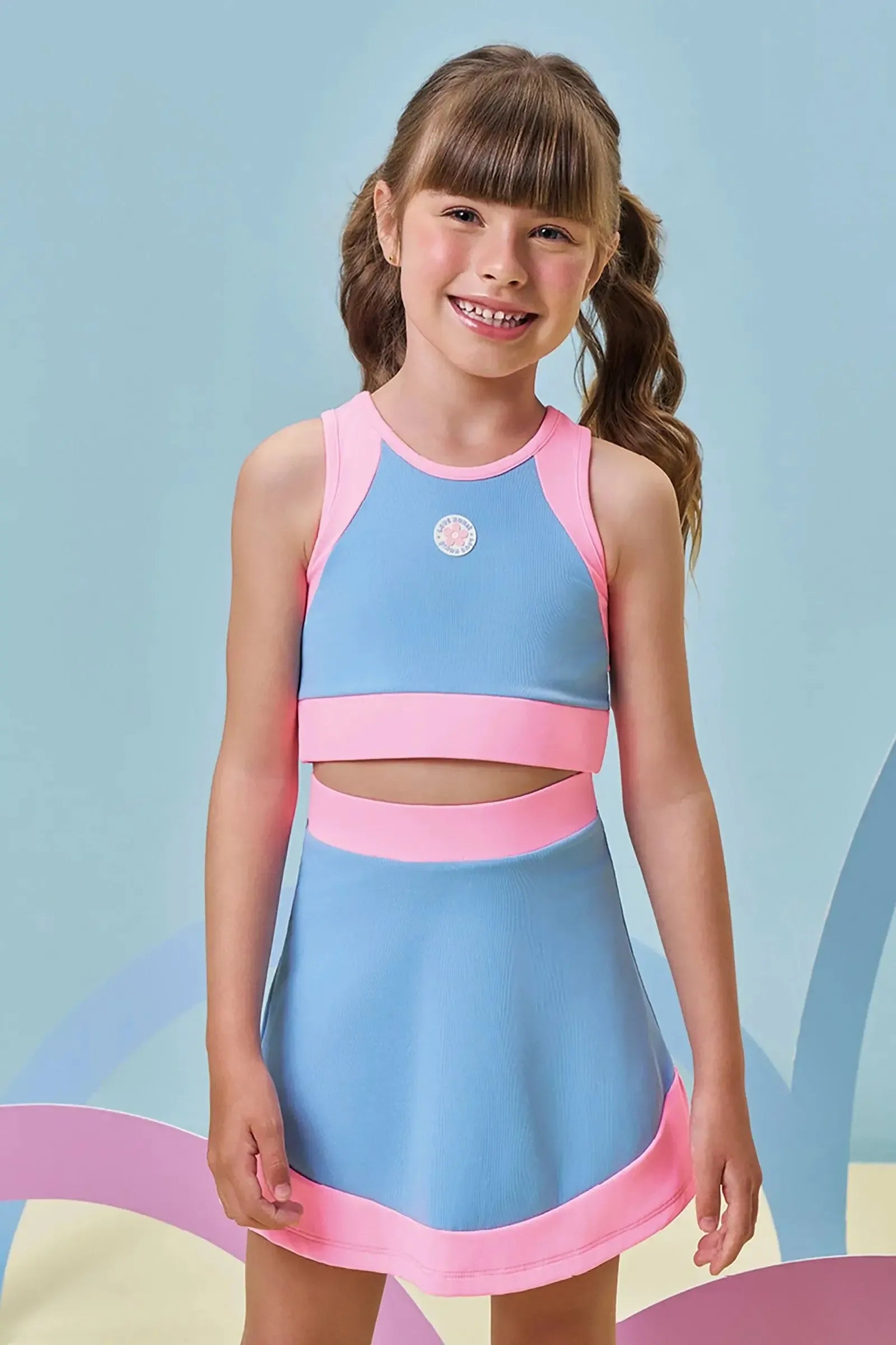 Conjunto de Top Cropped e Saia Esportiva em Poliamida (com Shorts Embutido) 96979 Kukiê Infantil Menina